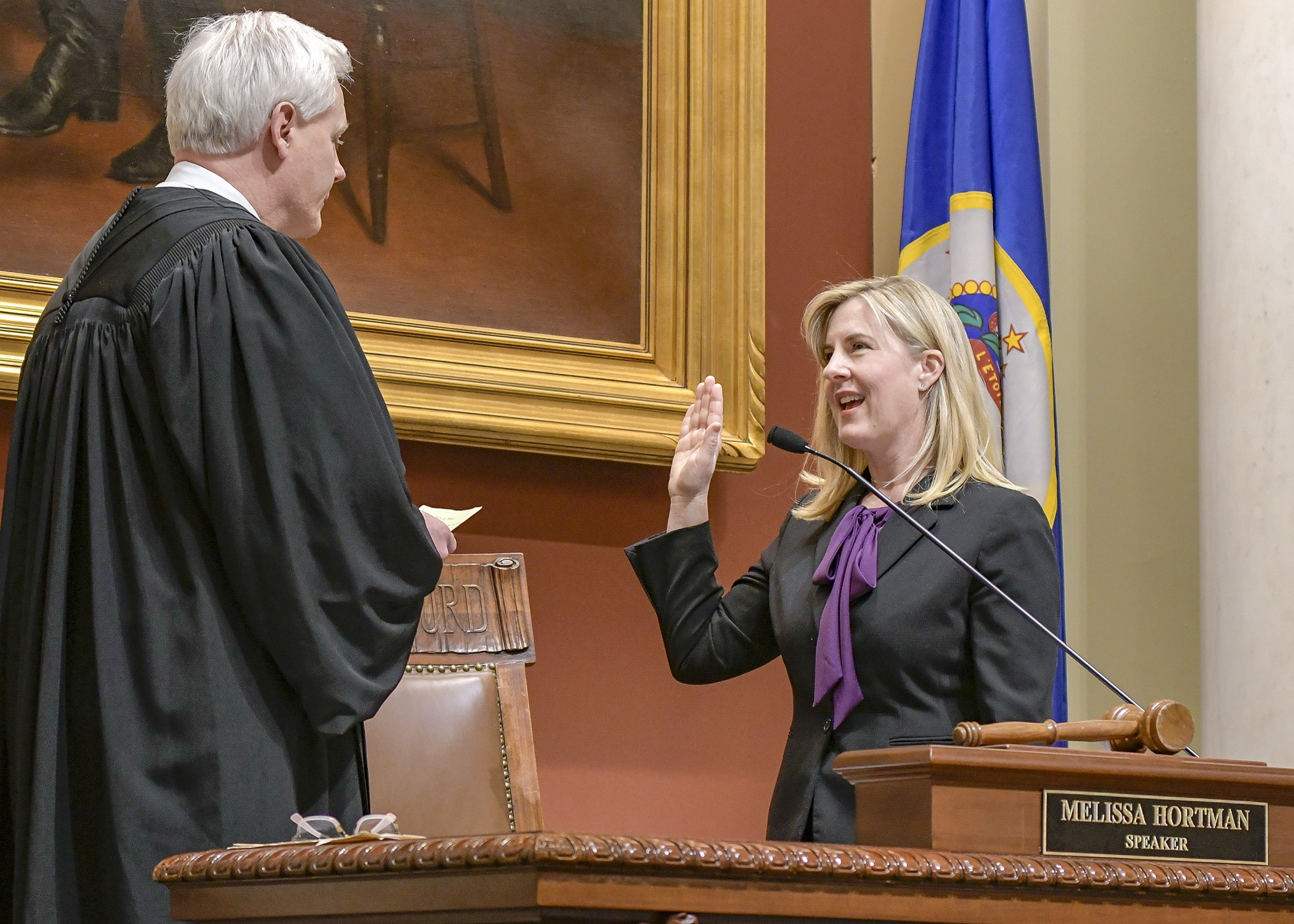 Rep. Melissa Hortman is sworn in as House speaker Tuesday by Associate Supreme Court Justice — and former speaker — Paul Thissen. Photo by Andrew VonBank